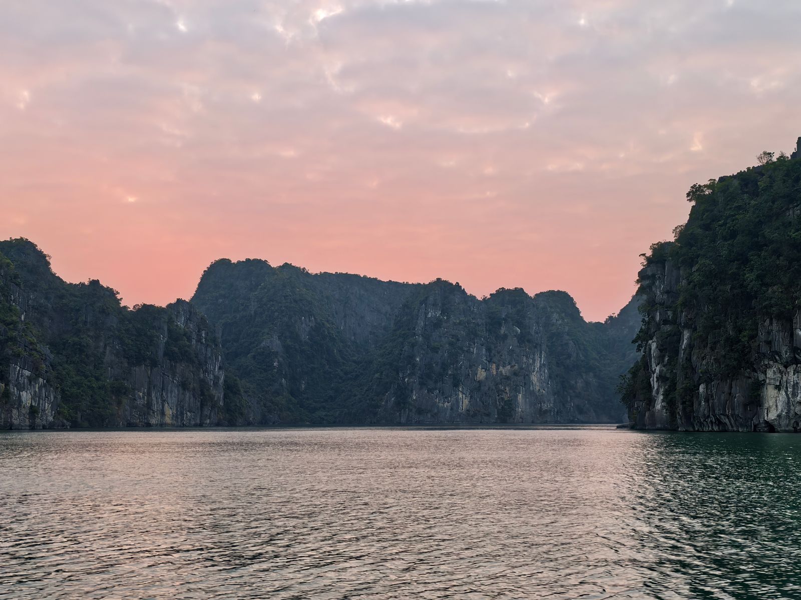 Karst islands of Halong Bay under soft light